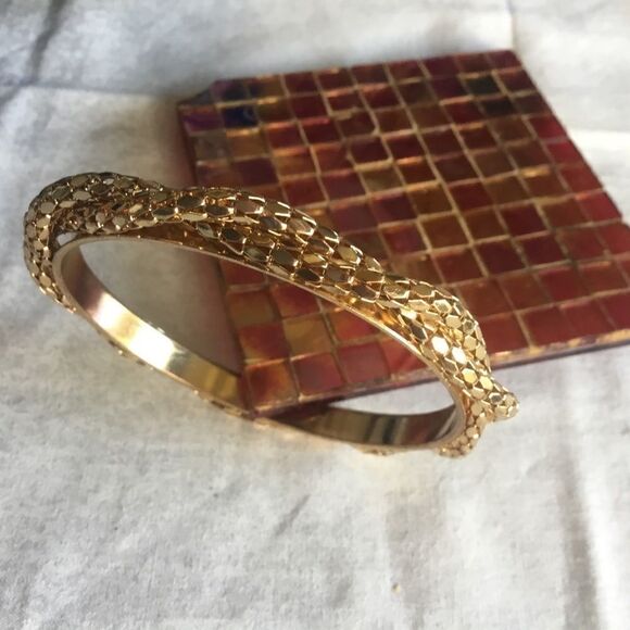 $8 ea or 3/$15. Goldtone Bangle Bracelet - Picture 1 of 8